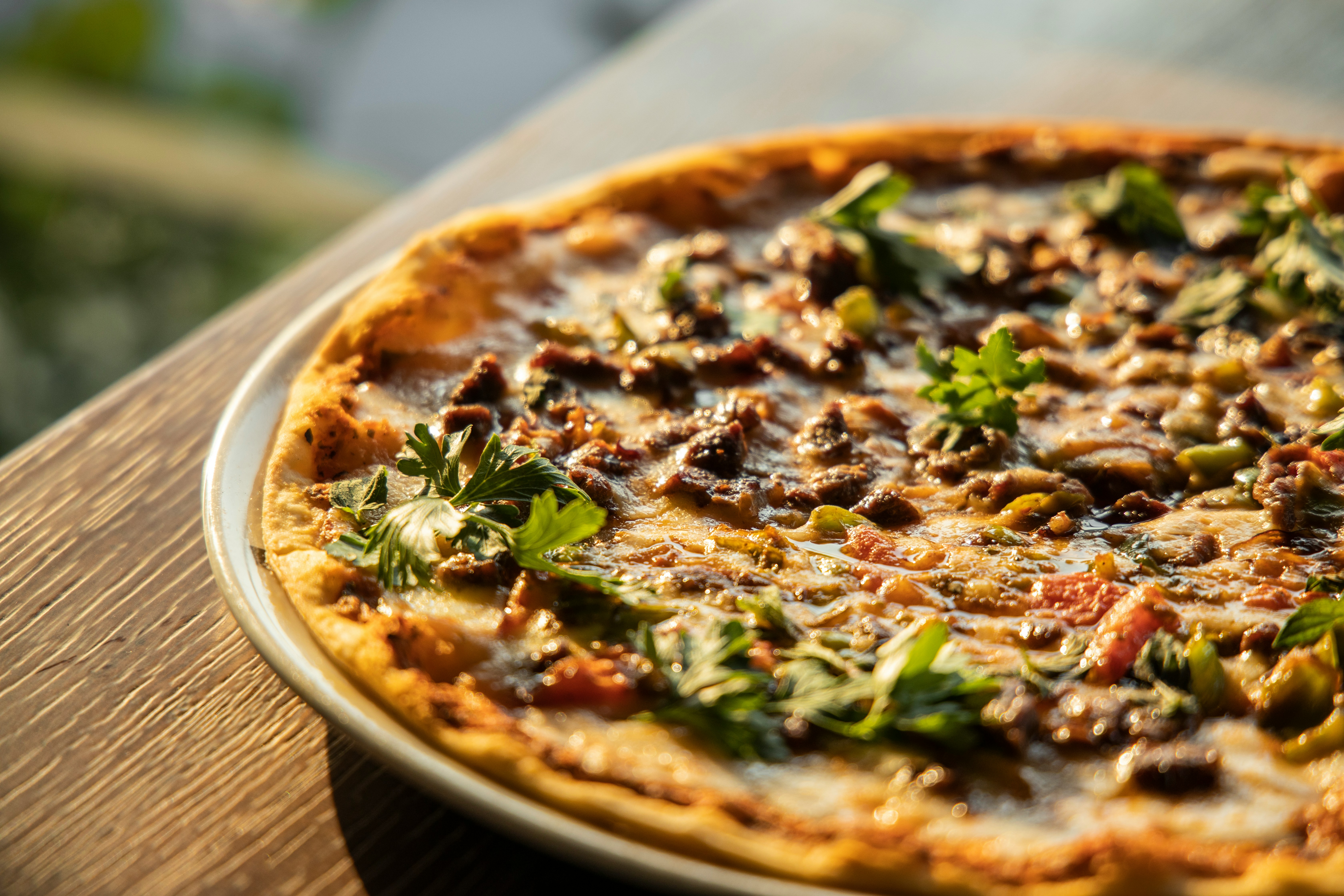 a pizza on a wooden table
