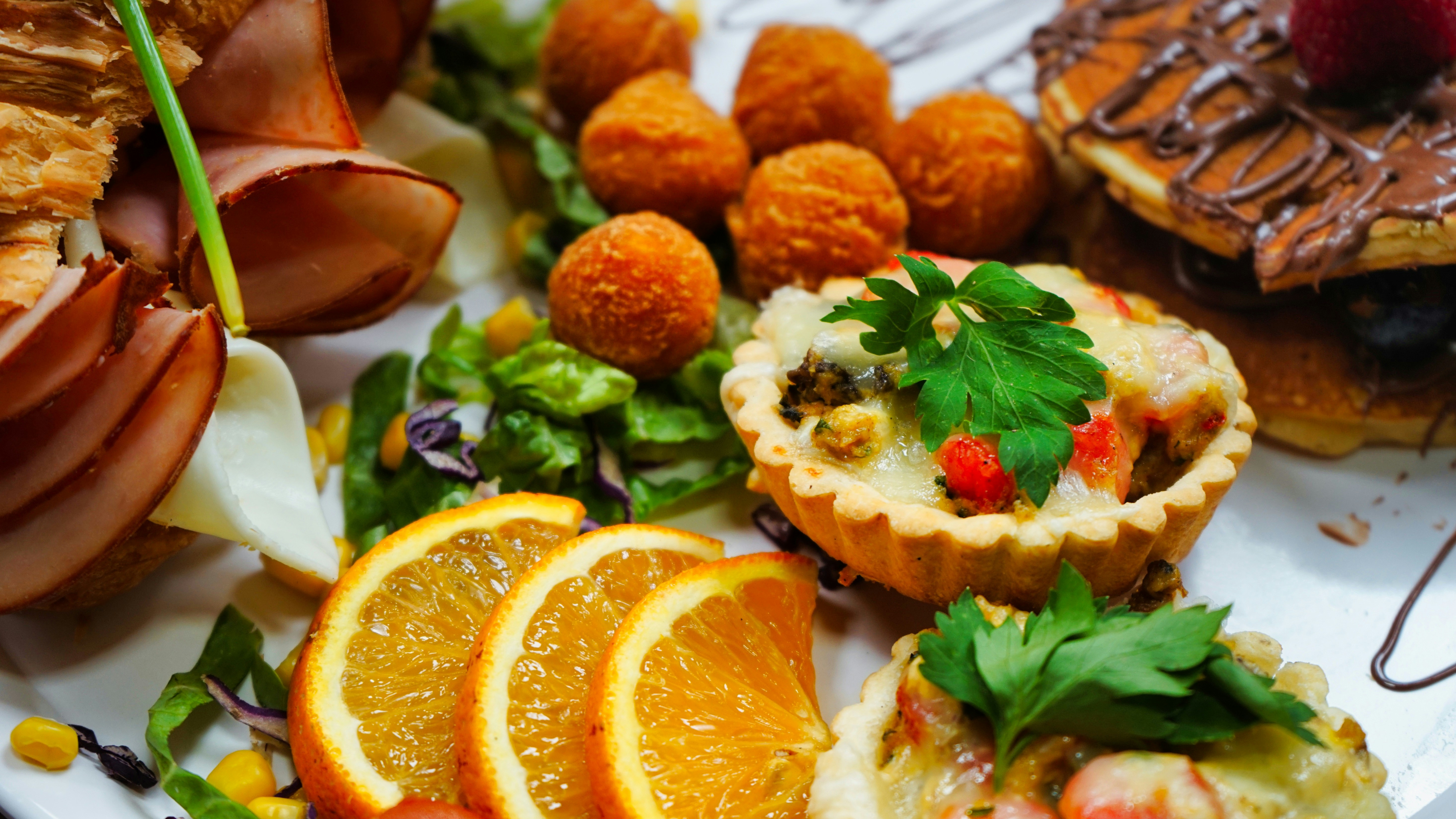 a white plate topped with oranges