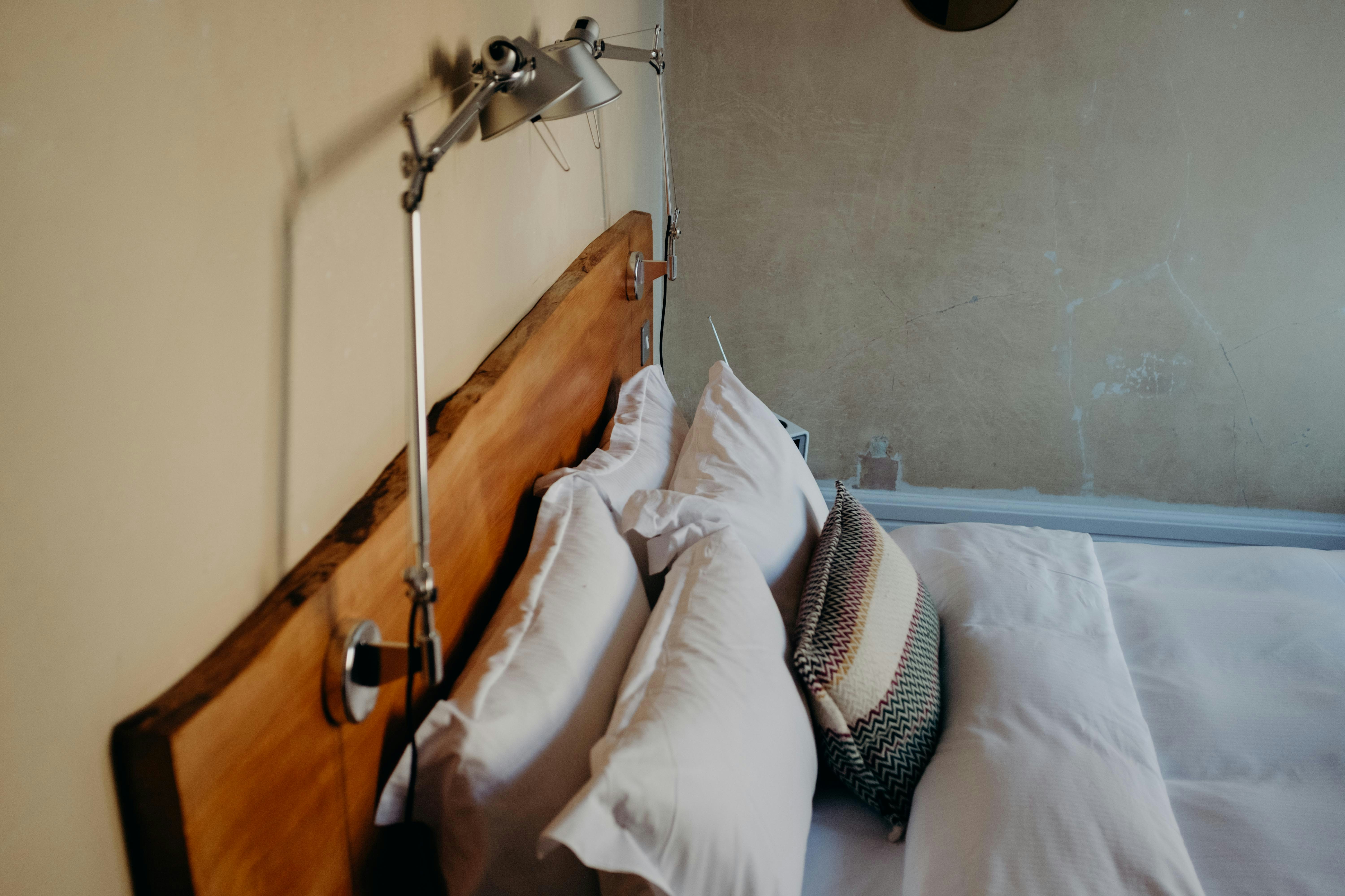 a bed with pillows