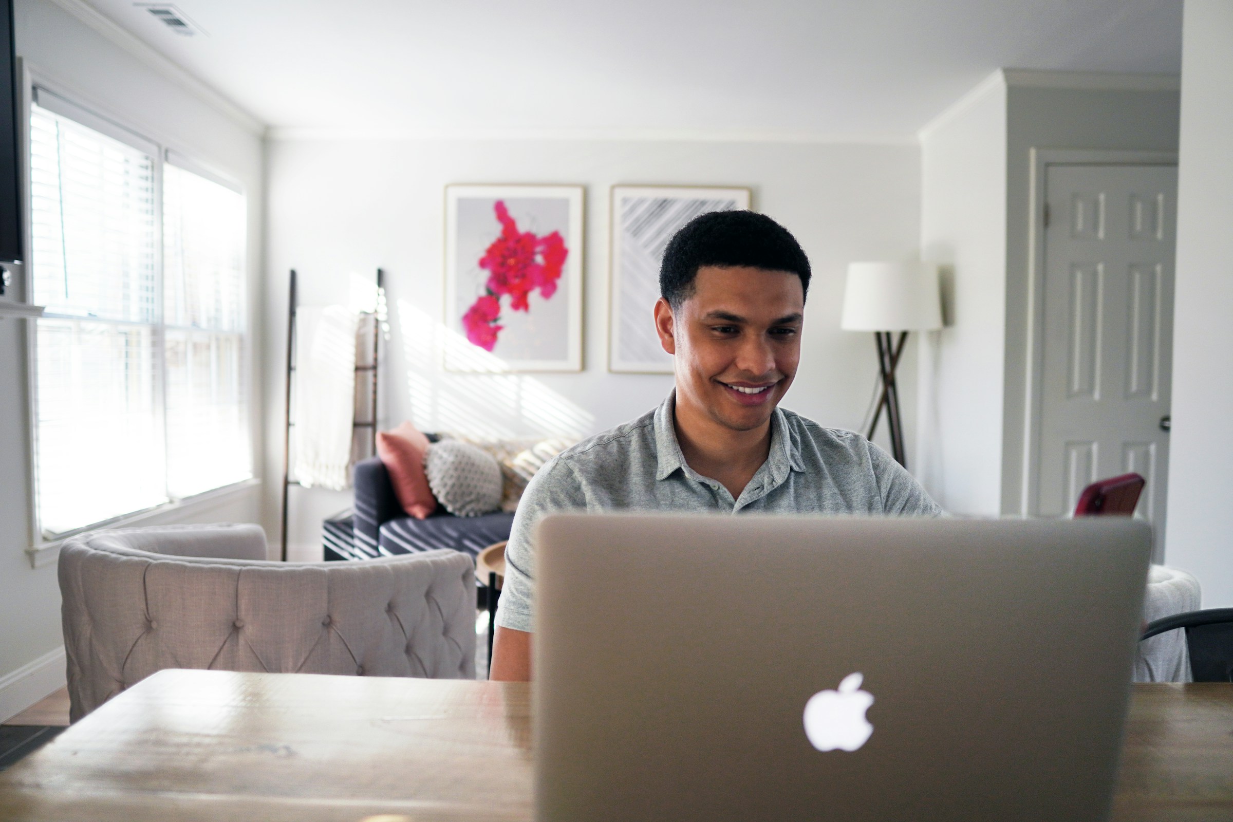 a man sitting in front of a computer