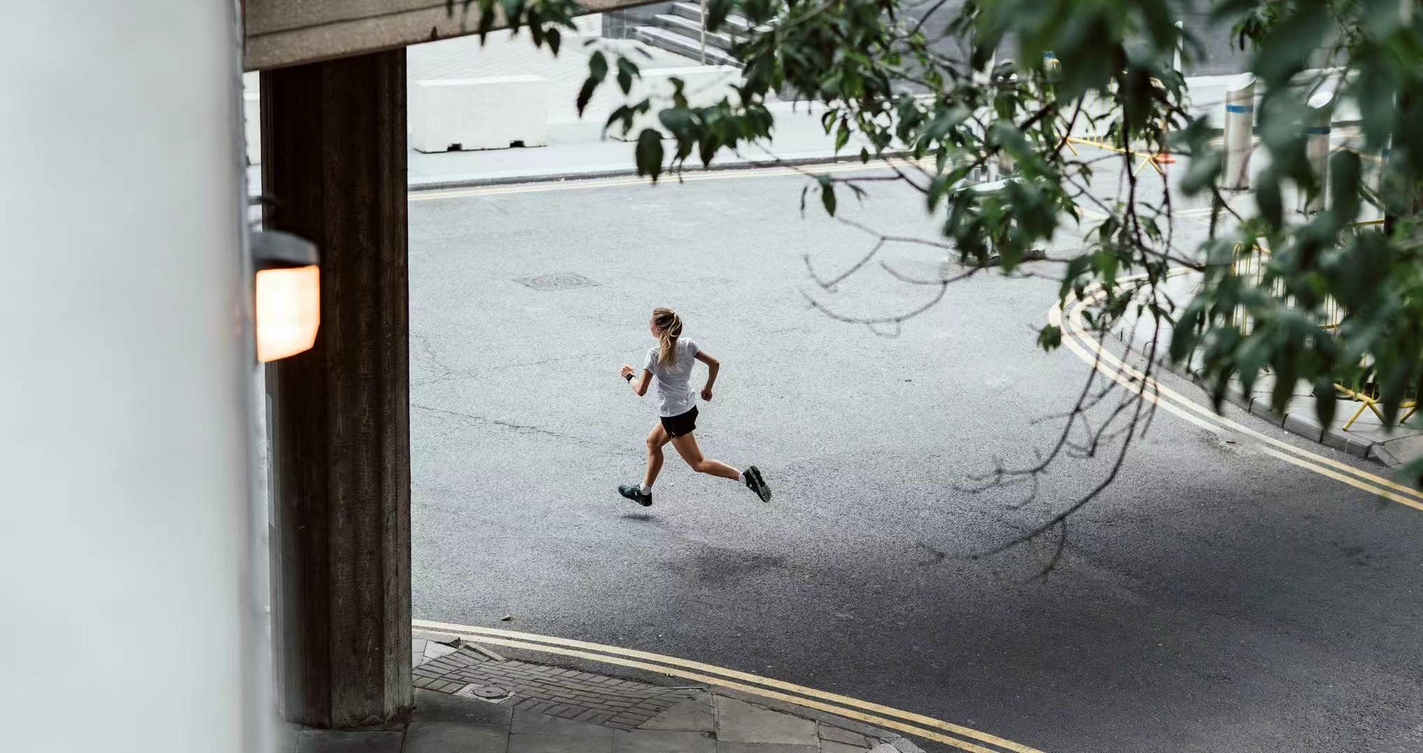 a woman running on the running path in London