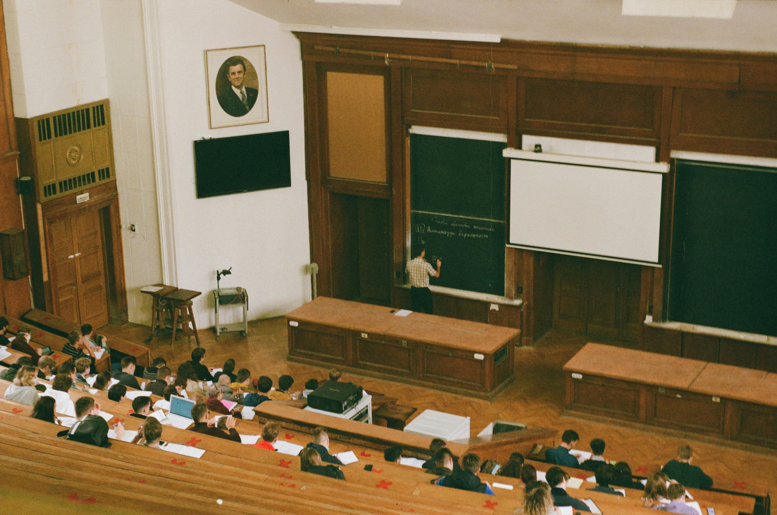 student sitting in a classroom in university