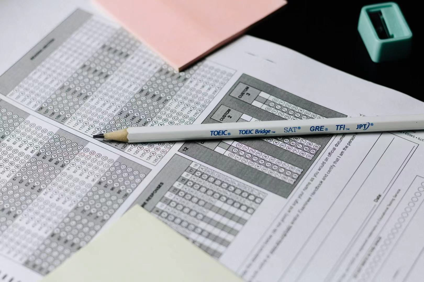 a pencil on top of a sheet of exam paper