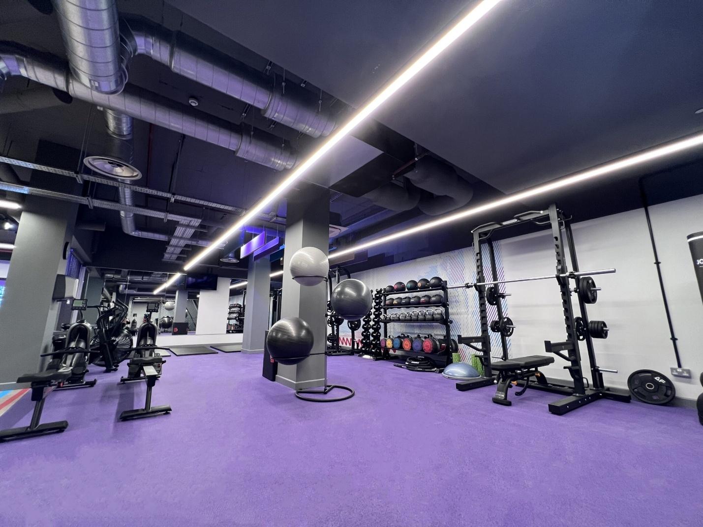 purple floor with many gym devices