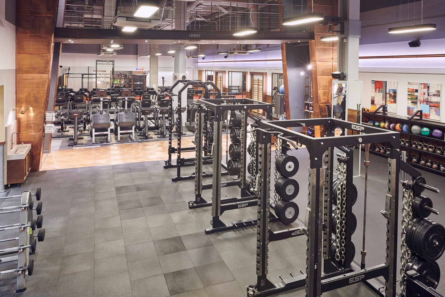 many fitness equipments in a bright gym