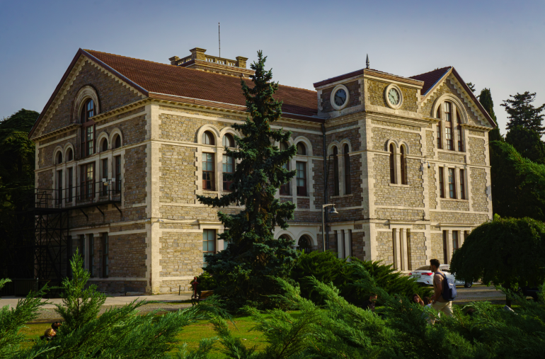 large building with a clock on top of it