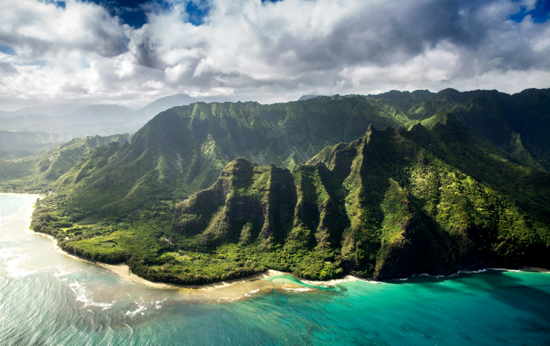aerial photography of Hawaiian mountain beside the ocean