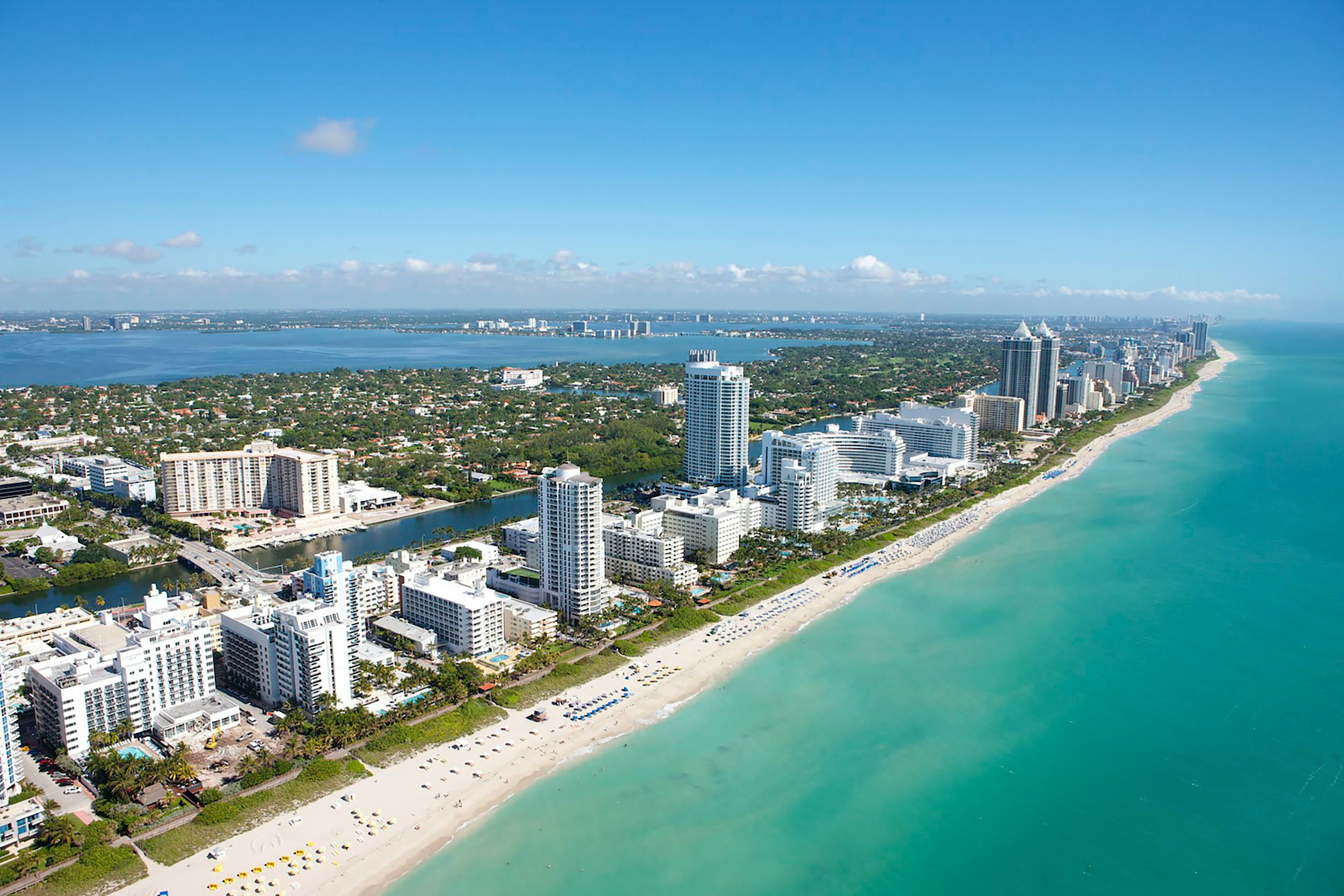 aerial pic of beach and building in Miami