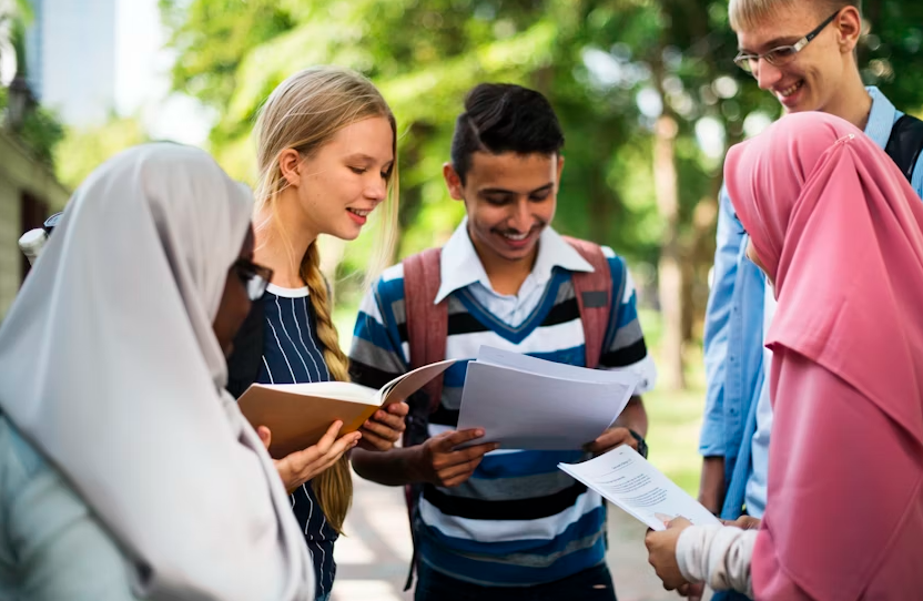 a group of diverse students talking about their studies